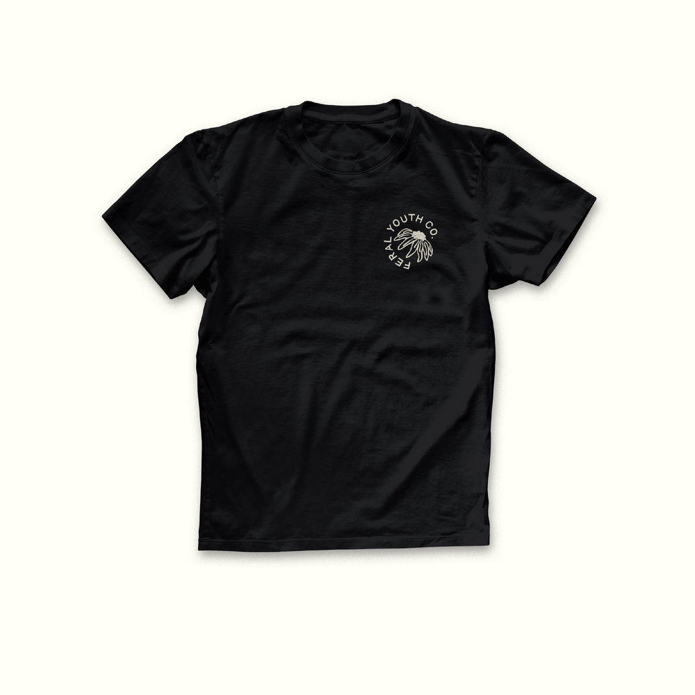 feral youth co pocket text on front side of shirt